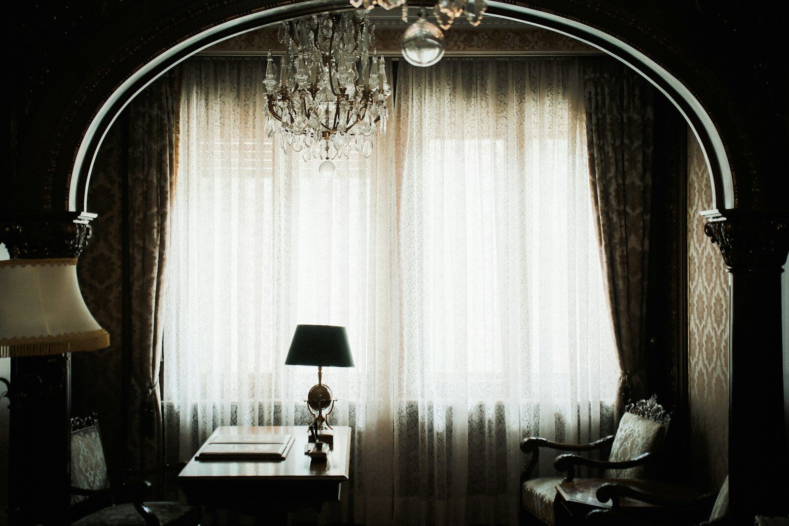Elegant room with chandelier and large window