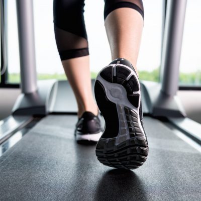 Close,Up,Shoes,Woman's,Muscular,Legs,Feet,During,Running,On